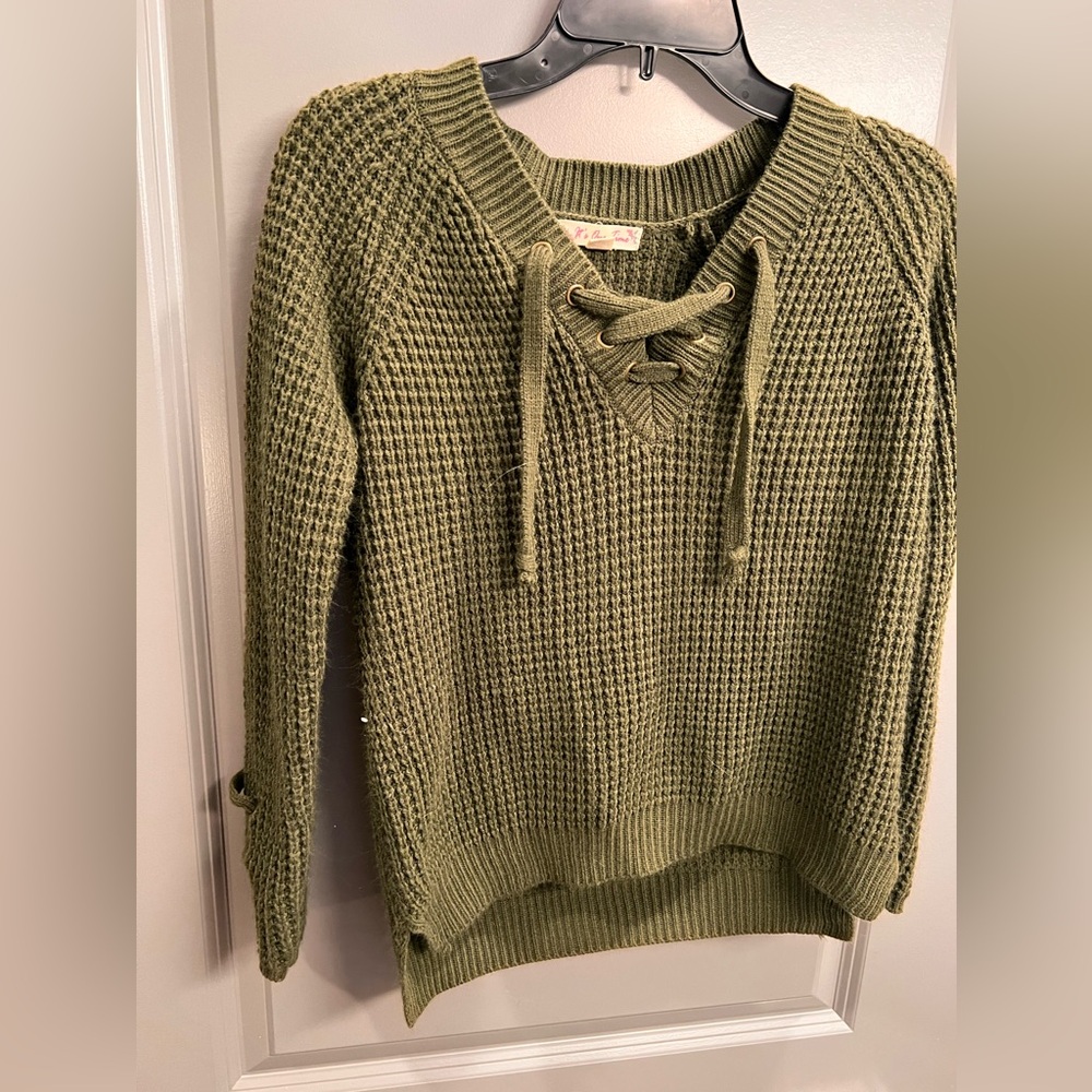It’s Our Time green sweater